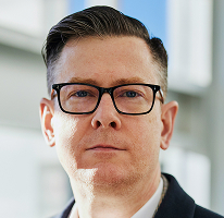 Executivo de empresa de trading de criptomoedas, CEO Alexander Hughes em retrato
